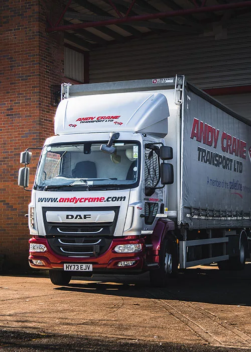 Andy Crane truck parked in front of garage